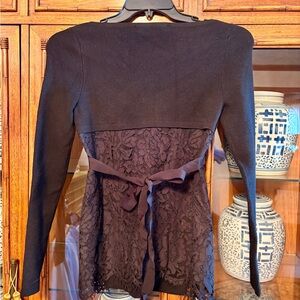 Beautiful black mixed-media sweater with elegant lace bottom